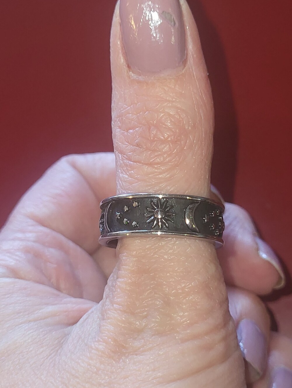 Black and silver tone moon sun and stars ring band Size 8